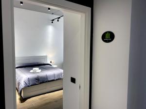 Postel nebo postele na pokoji v ubytování Business Home Via Isonzo B&B