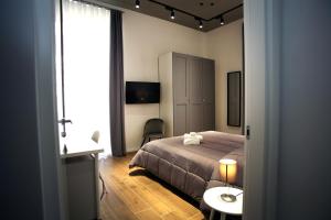 Postel nebo postele na pokoji v ubytování Business Home Via Isonzo B&B