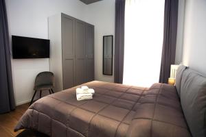 Postel nebo postele na pokoji v ubytování Business Home Via Isonzo B&B
