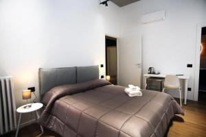 Postel nebo postele na pokoji v ubytování Business Home Via Isonzo B&B