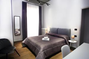 Postel nebo postele na pokoji v ubytování Business Home Via Isonzo B&B