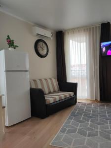 Posezení v ubytování Afrodita Palas , studio appartment 4 floor, pool view