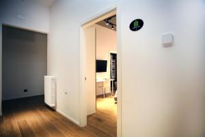 TV a/nebo společenská místnost v ubytování Business Home Via Isonzo B&B