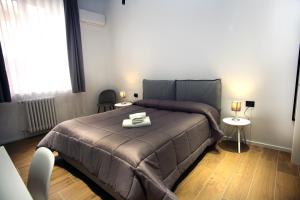 Postel nebo postele na pokoji v ubytování Business Home Via Isonzo B&B