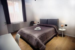 Postel nebo postele na pokoji v ubytování Business Home Via Isonzo B&B