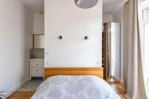 Posteľ alebo postele v izbe v ubytovaní Appt F4 Neuf Lumineux, centre Ville, Garage