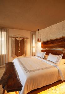 Postel nebo postele na pokoji v ubytování Hotel Scappata
