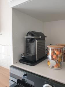Kuchyňa alebo kuchynka v ubytovaní Cozy-Room Appartement