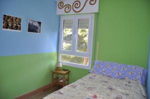 A bed or beds in a room at Bonito piso con vistas al mar.