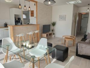 Televízia a/alebo spoločenská miestnosť v ubytovaní Cozy-Room Appartement