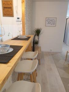 Kuchyňa alebo kuchynka v ubytovaní Cozy-Room Appartement