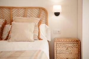 Postel nebo postele na pokoji v ubytování La Plaza Hostal
