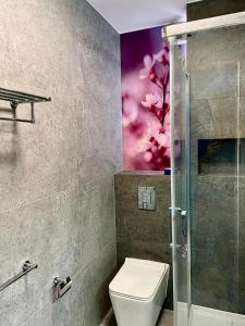 Ένα μπάνιο στο Apartamenty ELITMAT