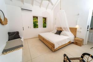 Postel nebo postele na pokoji v ubytování Casa Panamera- 5br luxury beach Villa Playa Coson