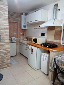 Kuchyň nebo kuchyňský kout v ubytování El Nogal monoambiente kichenete + 2 fotografie