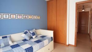 Postel nebo postele na pokoji v ubytování Apartamento con vistas, ascensor y parking en Portosín