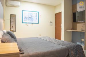 Postel nebo postele na pokoji v ubytování Habitación hotelera 5min de la playa by G P S rentas + 5 fotografií