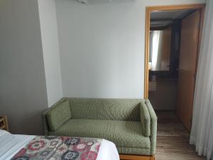 Lets Idea Hotel Flat Particular客房内的一张或多张床位