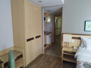 Lets Idea Hotel Flat Particular客房内的一张或多张床位
