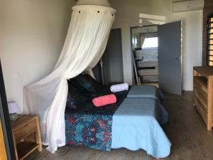 Postelja oz. postelje v sobi nastanitve Calypso Bay