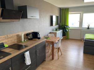 Η κουζίνα ή μικρή κουζίνα στο Apartment Stadtblick +3 φωτογραφίες