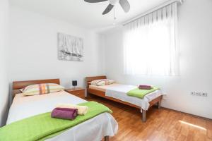 Postel nebo postele na pokoji v ubytování kuća za odmor Iris