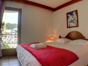 Ein Bett oder Betten in einem Zimmer der Unterkunft Cristal d'Argentière - Mont-Blanc