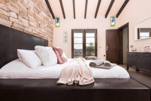 Ένα ή περισσότερα κρεβάτια σε δωμάτιο στο Casa El Kornao, Fuerteventura
