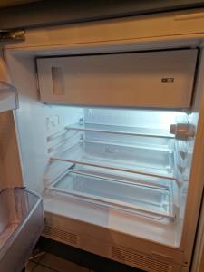 Η κουζίνα ή μικρή κουζίνα στο Apartman Orange - Snjezna Dolina