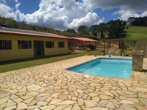 Swimmingpoolen hos eller tæt på Recanto Estrela da Manhã