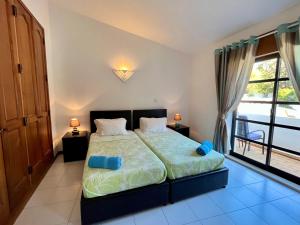 En eller flere senge i et værelse på Apartment 136 Carvoeiro