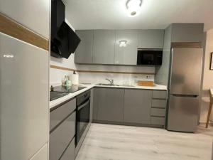 A cozinha ou cozinha compacta de Apartamento Algaida lux