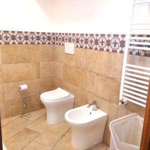 Ett badrum på Casa Francesco