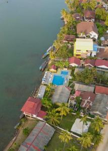 an aerial view of a resort in the water at Pan guest house in Ban Donsôm