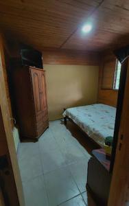 Een bed of bedden in een kamer bij Hostel Raíces Salta