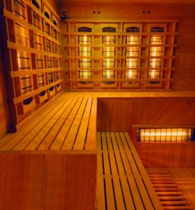 an empty room with a bench in the middle at TeoDorka Med & SPA in Ciechocinek