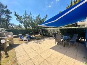 Κήπος έξω από το Maison avec piscine, tennis à 300m de la plage - 2 chambres, terrasse et parking privé - FR-1-231-267