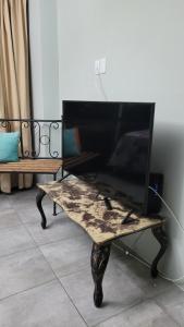 TV a/nebo společenská místnost v ubytování aparhotel 1309