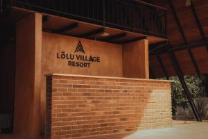 Certifikát, hodnocení, plakát nebo jiný dokument vystavený v ubytování Lolu Village Resort