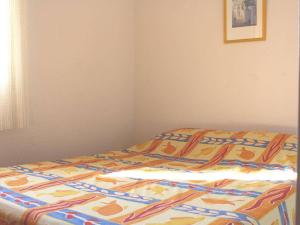 Posteľ alebo postele v izbe v ubytovaní Pavillon 3 pièces avec piscine, terrasse et parking privé - Proche plage et commerces - FR-1-229-812