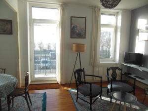 Posedenie v ubytovaní Appartement face plage Boulogne-sur-Mer - Balcon, WiFi, Terrasse commune, Tout inclus - FR-1-376-114