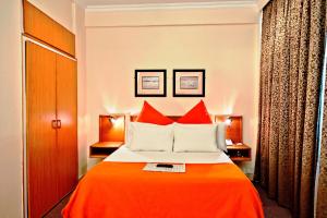 Hotel Thuringerhof tesisinde bir odada yatak veya yataklar