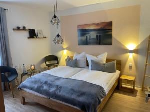 a bedroom with a large bed in a room at Haus Herzog in Bad Steben