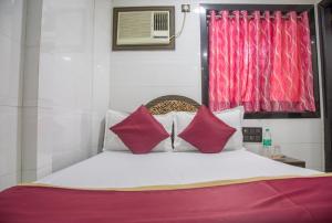 Ένα ή περισσότερα κρεβάτια σε δωμάτιο στο RELAX GUEST HOUSE