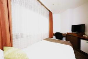 TV a/nebo společenská místnost v ubytování HOTEL MYSTAYS Utsunomiya