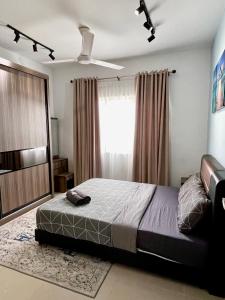 Voodi või voodid majutusasutuse Apartment in Ladang Tok Pelam toas