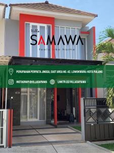 um edifício com uma placa que lê o Hotel Samwan em Villa Samawa em Malang
