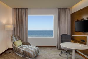 a hotel room with a view of the ocean at Radisson Hotel Colombo in Colombo