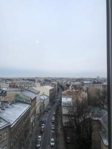 a view of a city from a window at Pokój 12B in Krakow