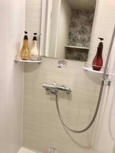 Koupelna v ubytování Dormy Inn Premium Ginza + 37 fotografií